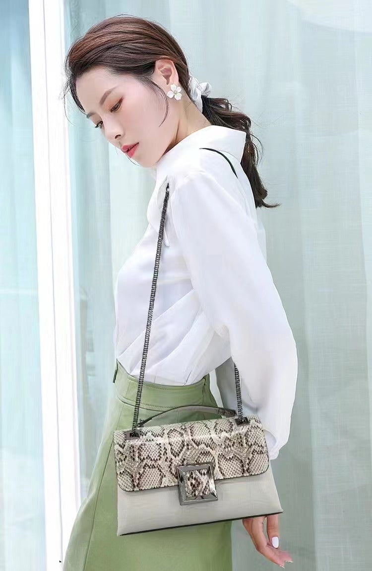 Top layer cowhide with snake embossed double chain shoulder bag——987